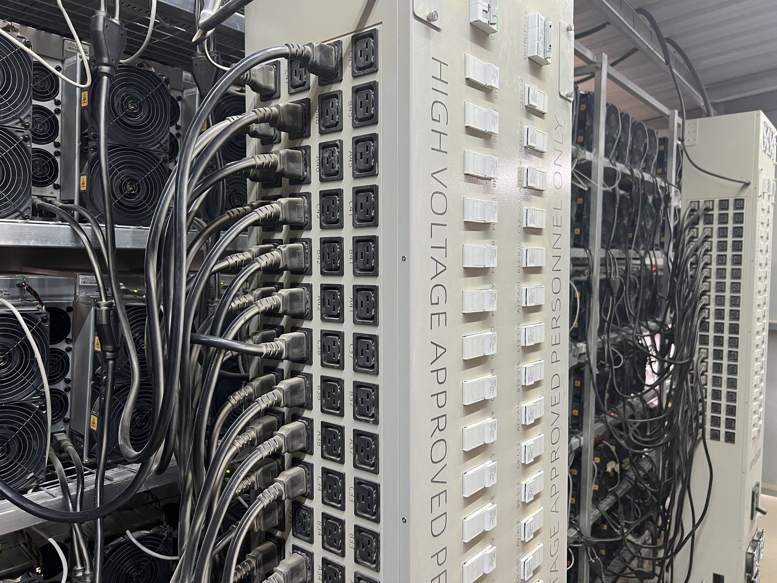 High-voltage PDU and data center equipment cabling used for power path and access review