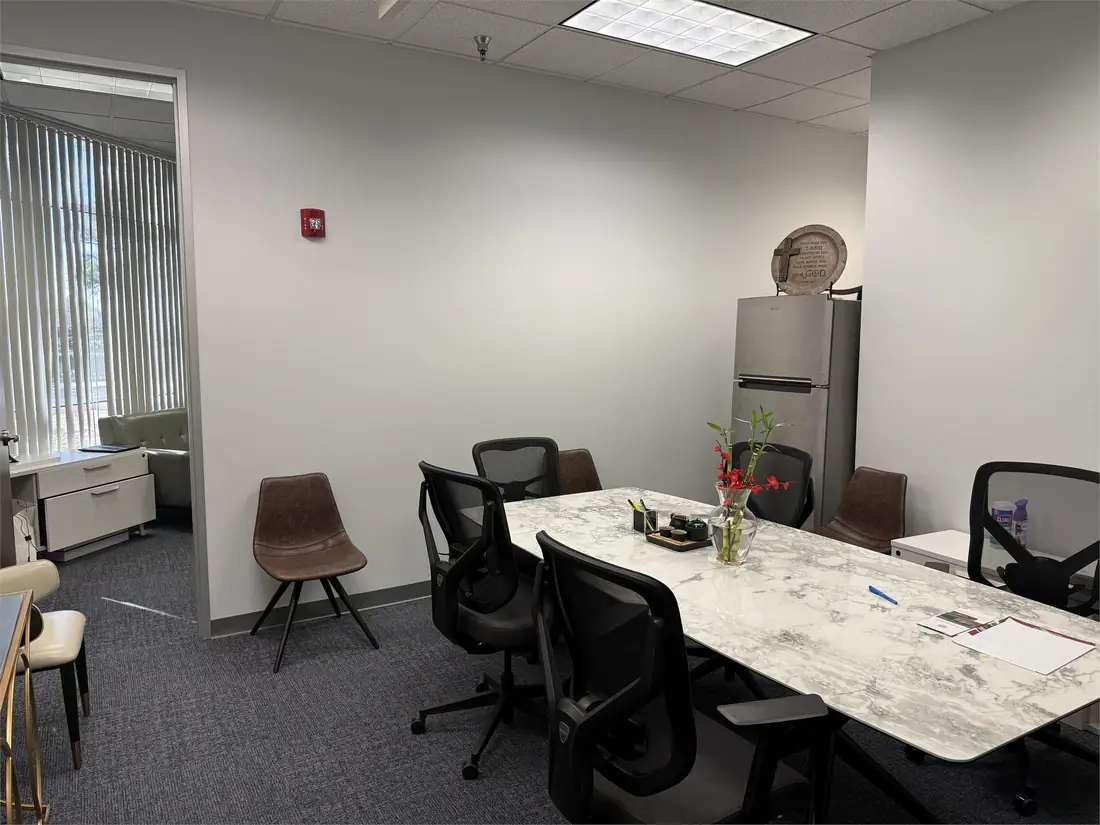 Conference room used for project communication and owner updates