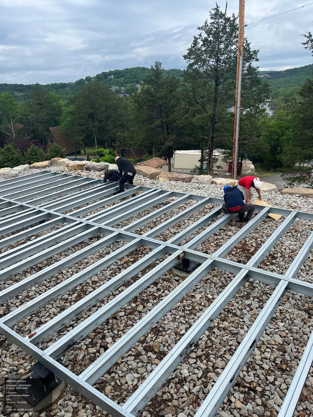 Prefab modular steel structure being installed at an active field site