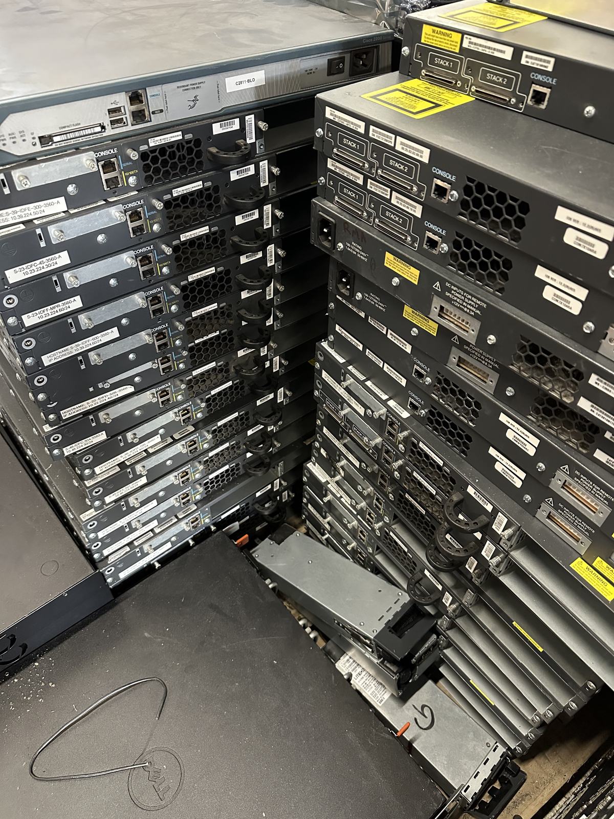 Equipment room rack staging for maintenance access, parts timing, and service notes