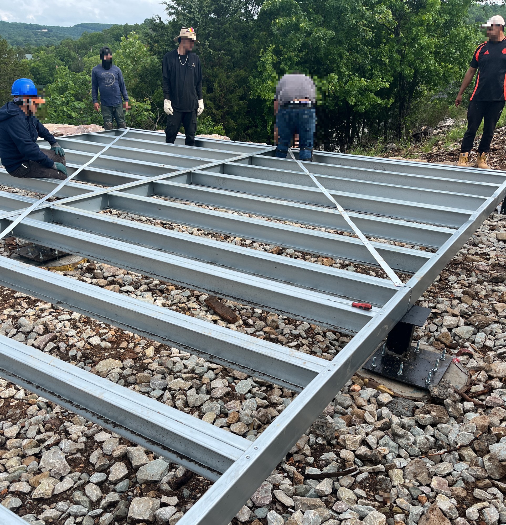 Crew standing on the completed steel floor platform with the Missouri hillside behind, 5 May 2026